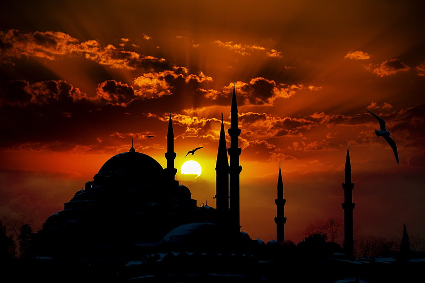 Suleymaniye Mosque Silhouette Against Dramatic Orange Sunset Sky