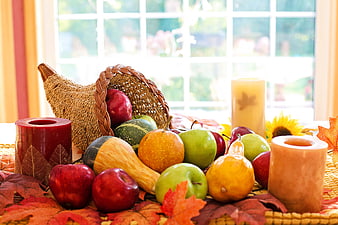 Autumn Harvest Table Setting With Cornucopia, Apples, and Candles