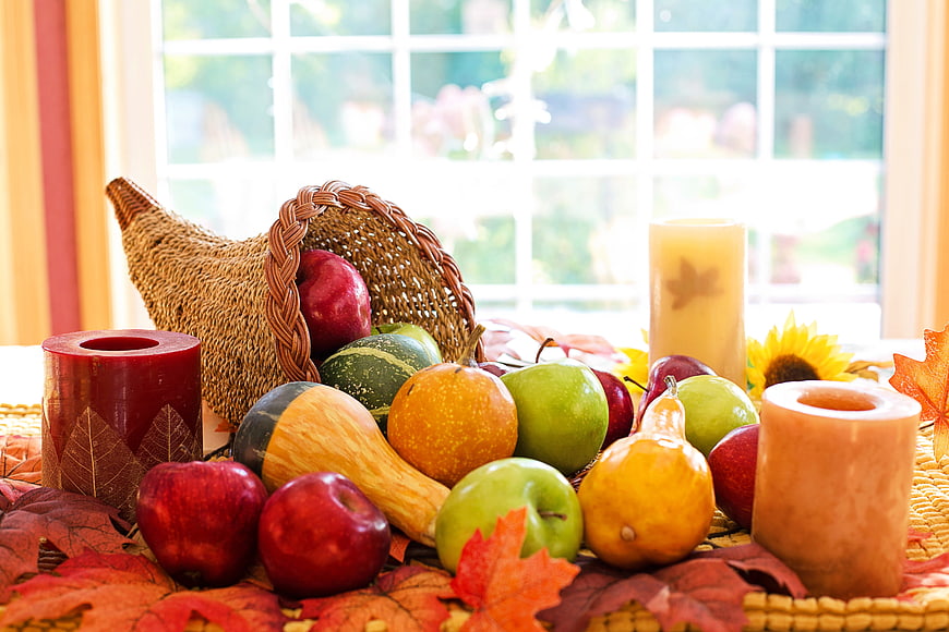Autumn Harvest Table Setting With Cornucopia, Apples, and Candles