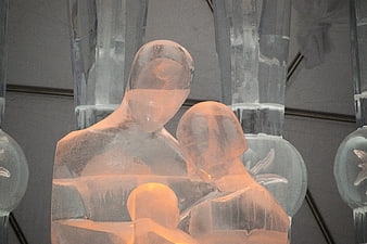 Illuminated Ice Sculpture of Family in High Tatras