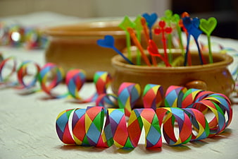 Colorful Paper Garland and Heart Picks in Ceramic Bowls