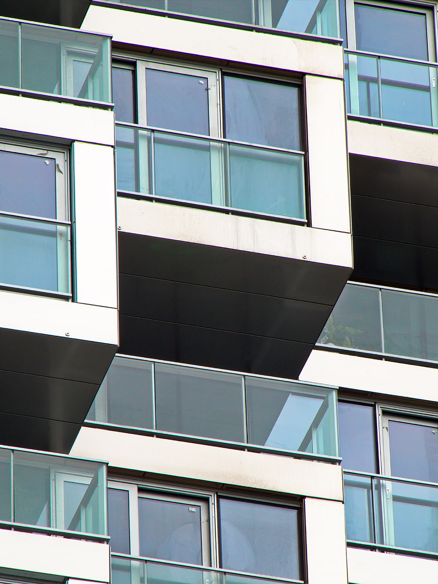 Modern Apartment Building Facade with Glass Balconies