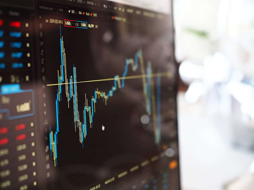 Close-up of financial stock market trading chart on computer screen