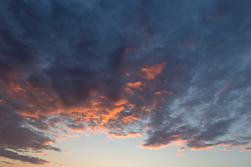 Dramatic Orange and Blue Sunset Clouds Sky