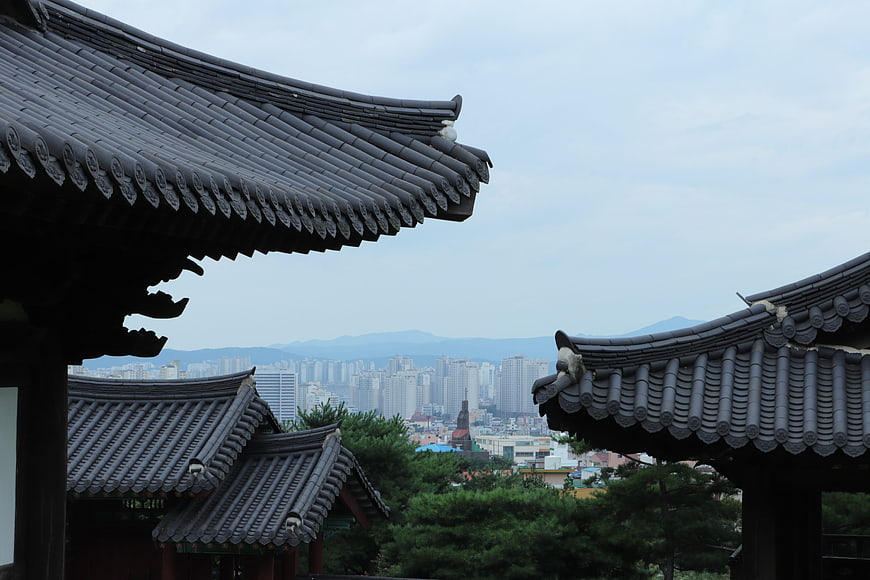 Traditional Korean Hanok Roofs Overlooking Modern Cityscape