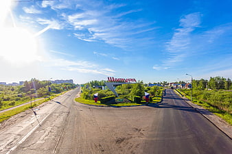 Shamora City Entrance Sign on Sunny Day