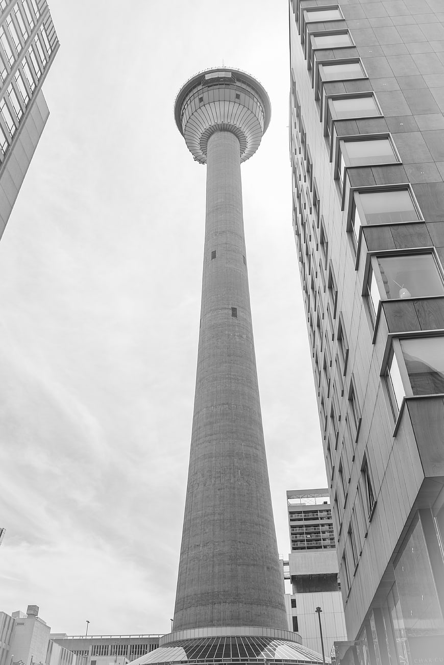 Low angle black and white view of Calgary Tower