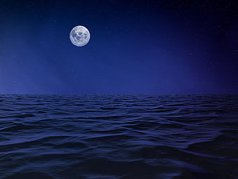 Full moon over dark ocean at night with stars