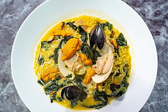 Seafood Ramen Bowl With Sea Urchin, Mussels, Clams, And Wakame