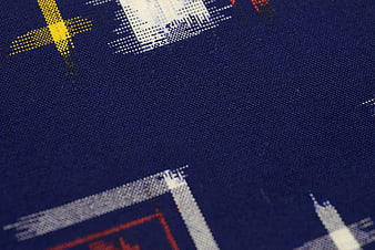 Close-up of blue woven fabric with geometric pattern
