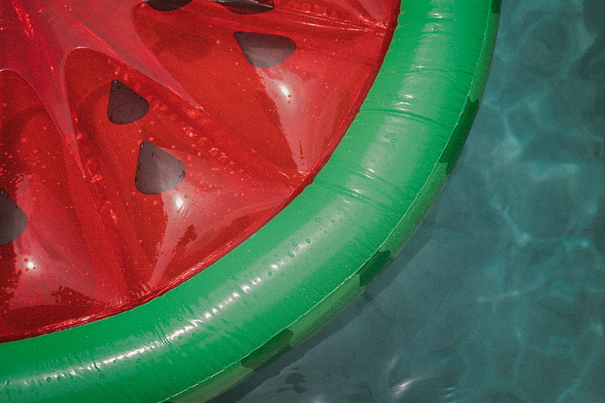 Watermelon Pool Float in Clear Blue Water