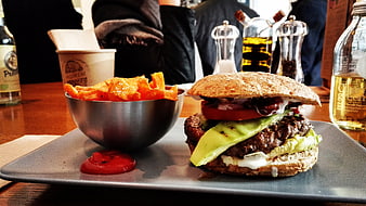 Gourmet Burger with Sweet Potato Fries on Gray Plate