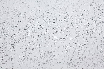 Water Droplets on Glass Surface Close Up