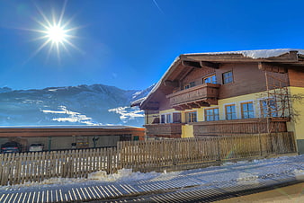 Traditional Alpine Chalet in Snowy Austrian Village