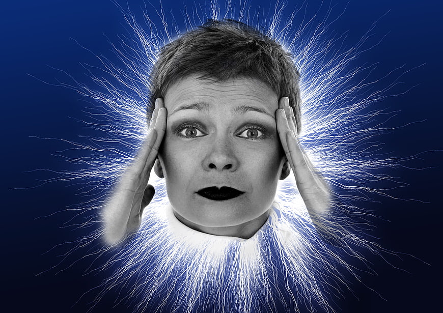 Distressed Woman With Electric Static Discharge Concept