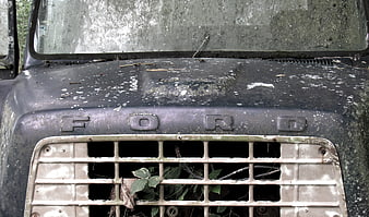 Close-up of Abandoned Vintage Ford Truck Front Grille