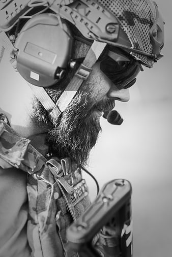 Black and White Close-Up Portrait of Bearded Tactical Soldier in Profile