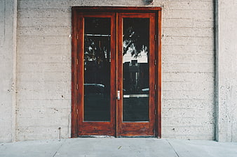 Modern Wooden Double Doors on Concrete Wall