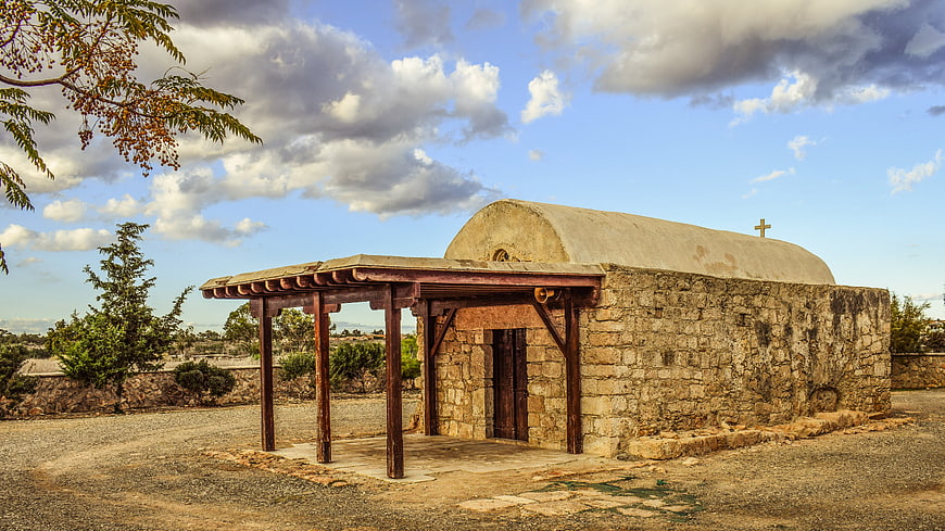 Old stone chapel with wooden porch in Cyprus