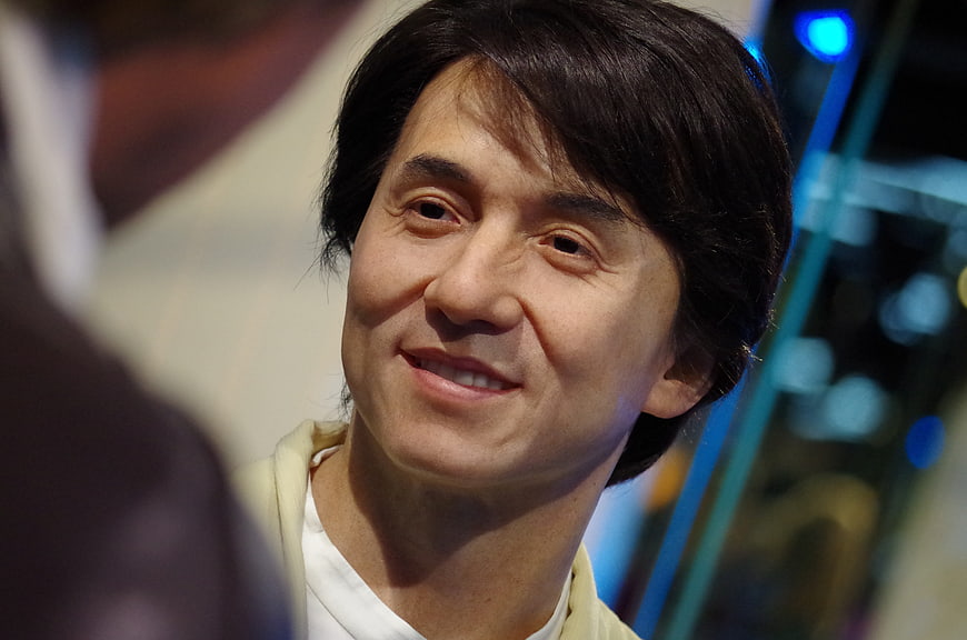 Close-up of Jackie Chan wax figure smiling