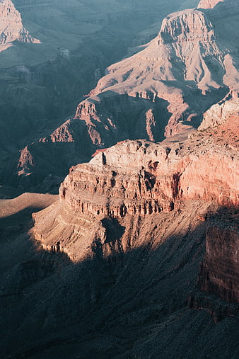 Sunlit Canyon Landscape with Dramatic Shadows