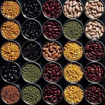Top View of Various Beans and Legumes in Metal Bowls