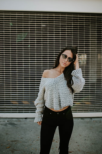 Stylish Woman in Off-Shoulder Sweater and Sunglasses