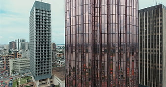 Modern Skyscrapers with Reflective Glass Facade in Urban Cityscape