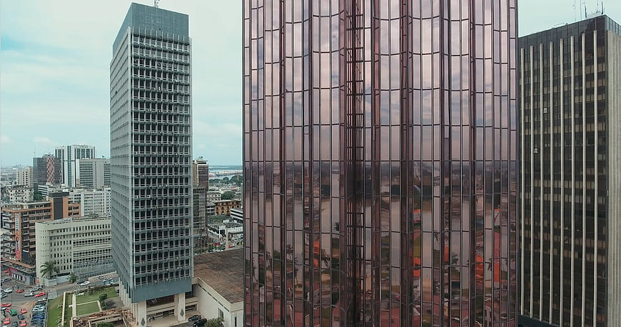 Modern Skyscrapers with Reflective Glass Facade in Urban Cityscape