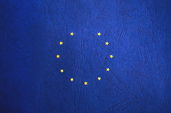 European Union Flag Close-Up on Textured Blue Fabric