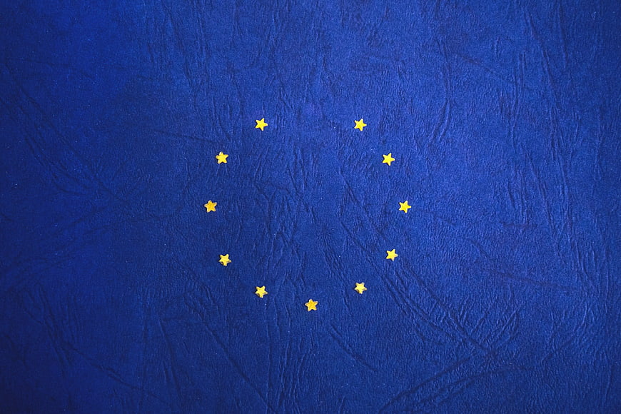 European Union Flag Close-Up on Textured Blue Fabric