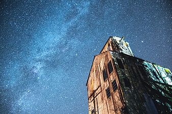 Milky Way Galaxy Over Old Industrial Building at Night