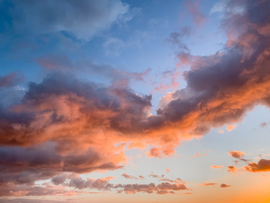 Dramatic sunset sky with vibrant orange and pink clouds