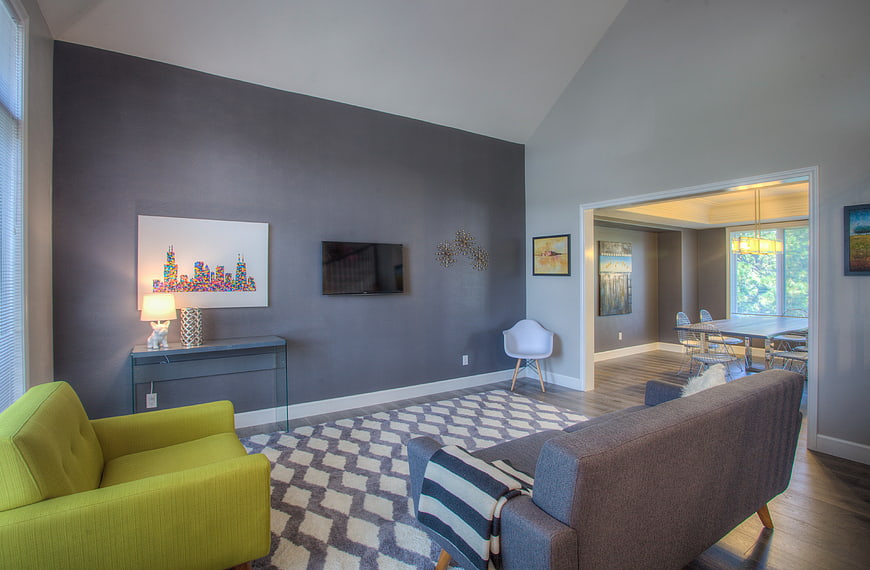 Modern Living Room with Gray Accent Wall and Lime Green Chair
