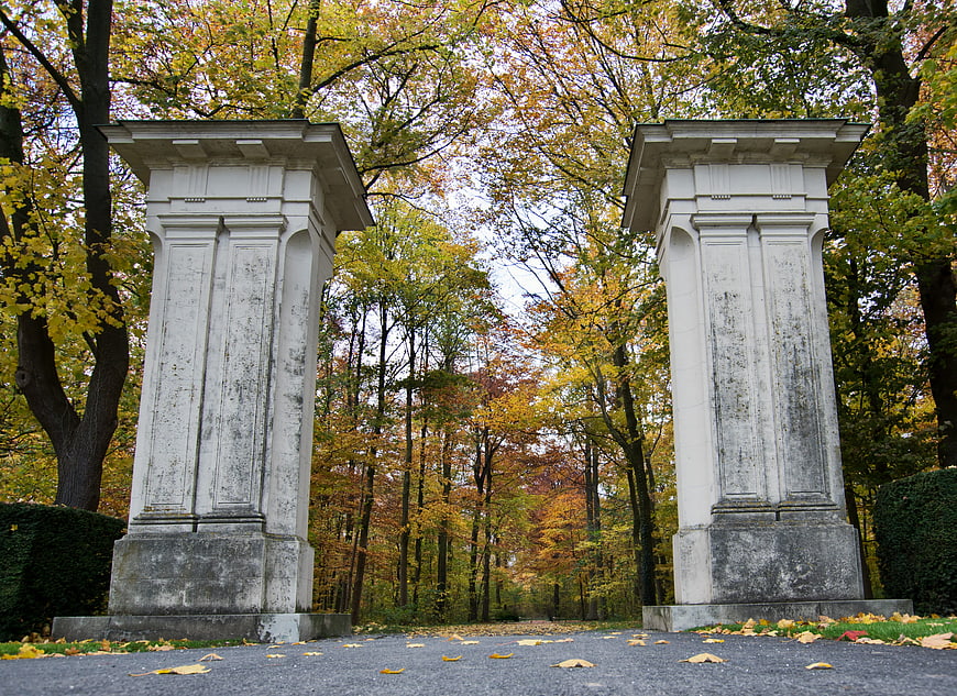 Autumn Park Entrance with Classical Stone Pillars