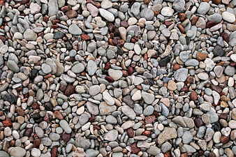 Top View of Smooth Multicolored River Pebbles and Stones