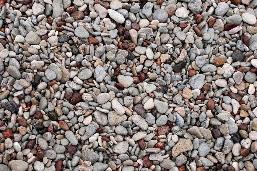 Top View of Smooth Multicolored River Pebbles and Stones
