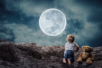 Toddler crawling on rocky terrain with teddy bear under giant moon