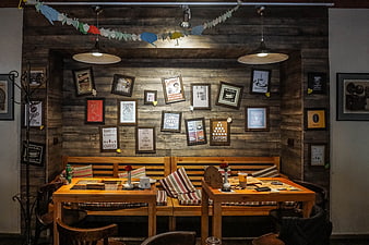 Cozy rustic cafe interior with wooden furniture and coffee art