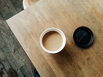 Top View of Coffee Cup on Wooden Table