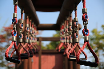 Red Rope Handles On Outdoor Playground Equipment