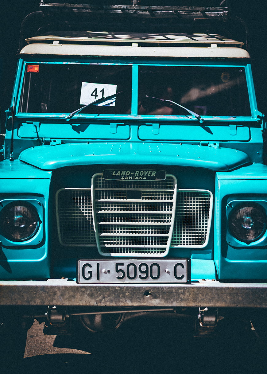 Front view of vintage turquoise Land Rover Santana