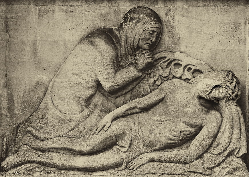 Ancient Stone Relief Sculpture of Mourning Woman and Deceased Man