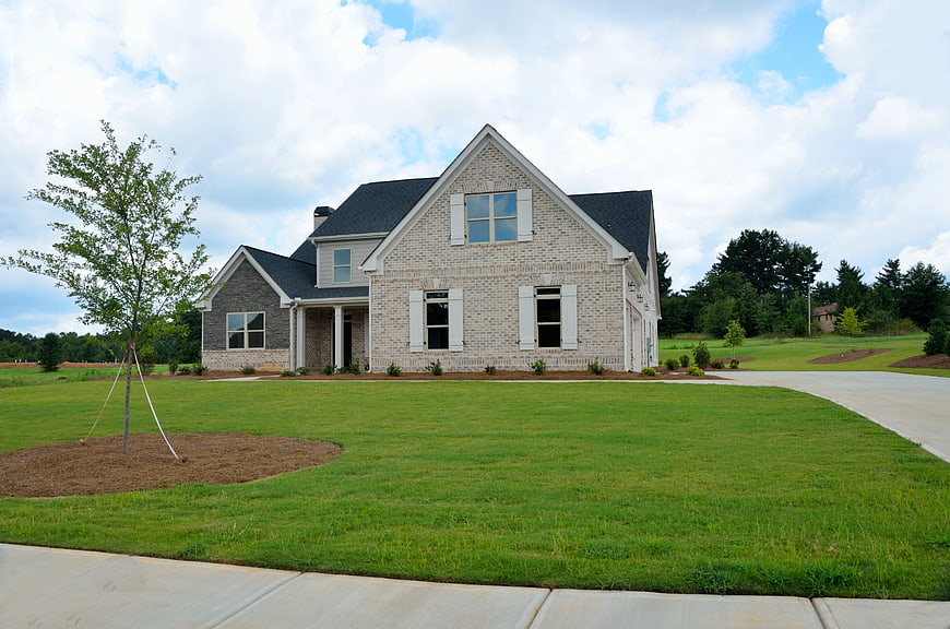 Modern Brick Suburban Home With Landscaped Front Yard