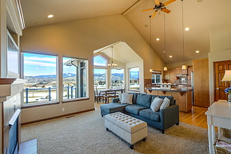 Spacious living room with mountain view and open kitchen
