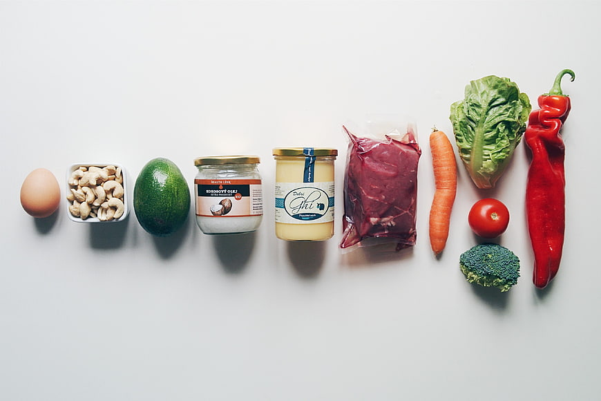 Flat lay of healthy fats ingredients on white background