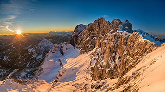 Sunset over Snowy Mountain Peaks in the Alps