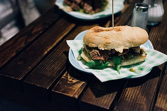 Argentinian beef steak sandwich on wooden table