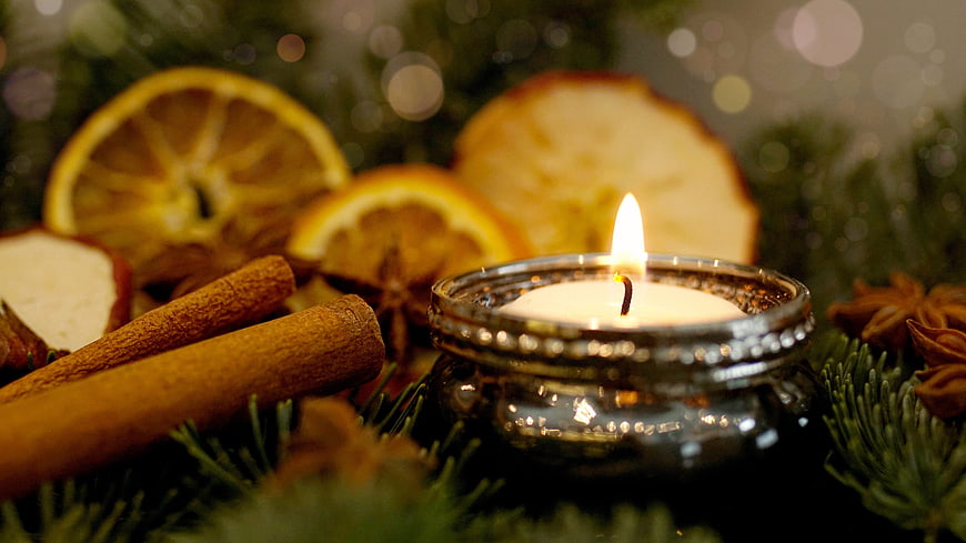 Christmas Candle with Cinnamon Sticks and Dried Oranges
