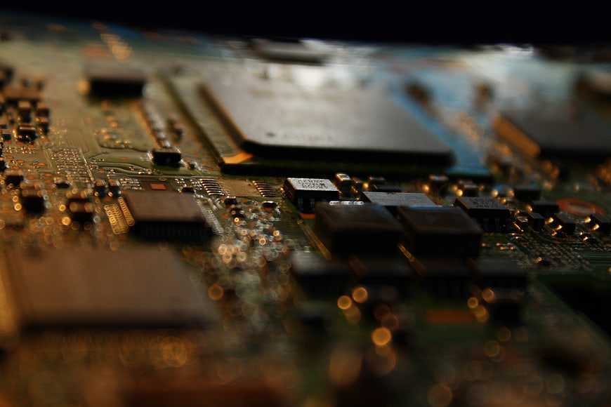 Close-up of electronic circuit board with processor and chips
